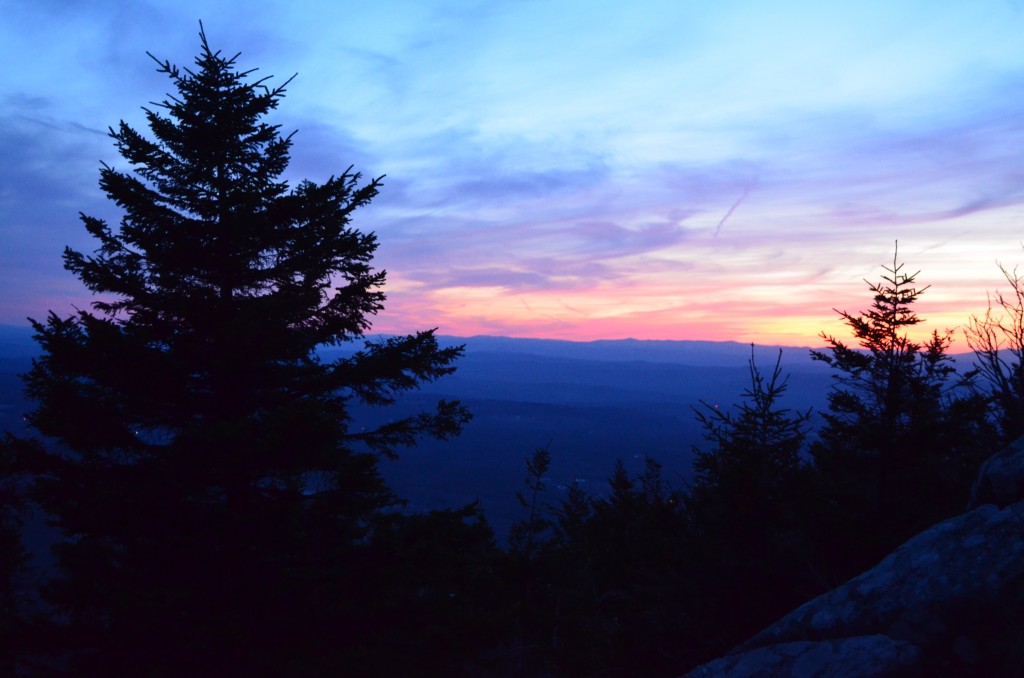 The sun sets behind the Green Mountains of Vermont, viewed from the White Arrow Trail. 04.04.13. Photo by Patrick Hummel.