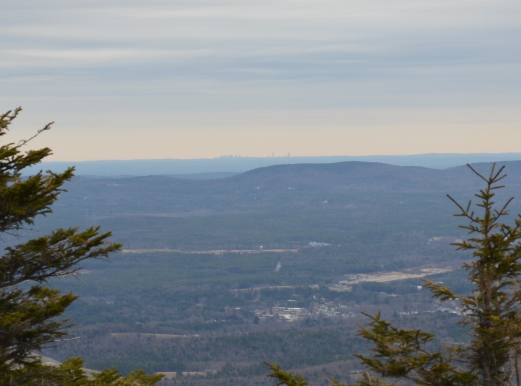 The skyline of the fair city of Boston in view on the horizon from Monadnock's White Dot Trail, 60 miles away. 04.18.13. Photo by Patrick Hummel