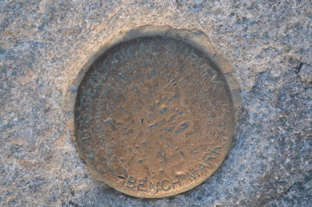 Fairly illegible now, here is the summit benchmark on Monadnock. Photo by Patrick Hummel.