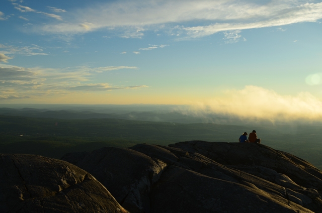 Hikers taking in the sweeping views of Monadnock's summit. 07.23.13. Photo by Patrick Hummel.