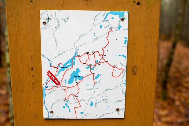 Helpful trail maps and junction markers posted by the Hollis NorEasters Snowmobile Club